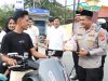 Polres Parimo Aksi Sosial Bagi 150 Paket Takjil